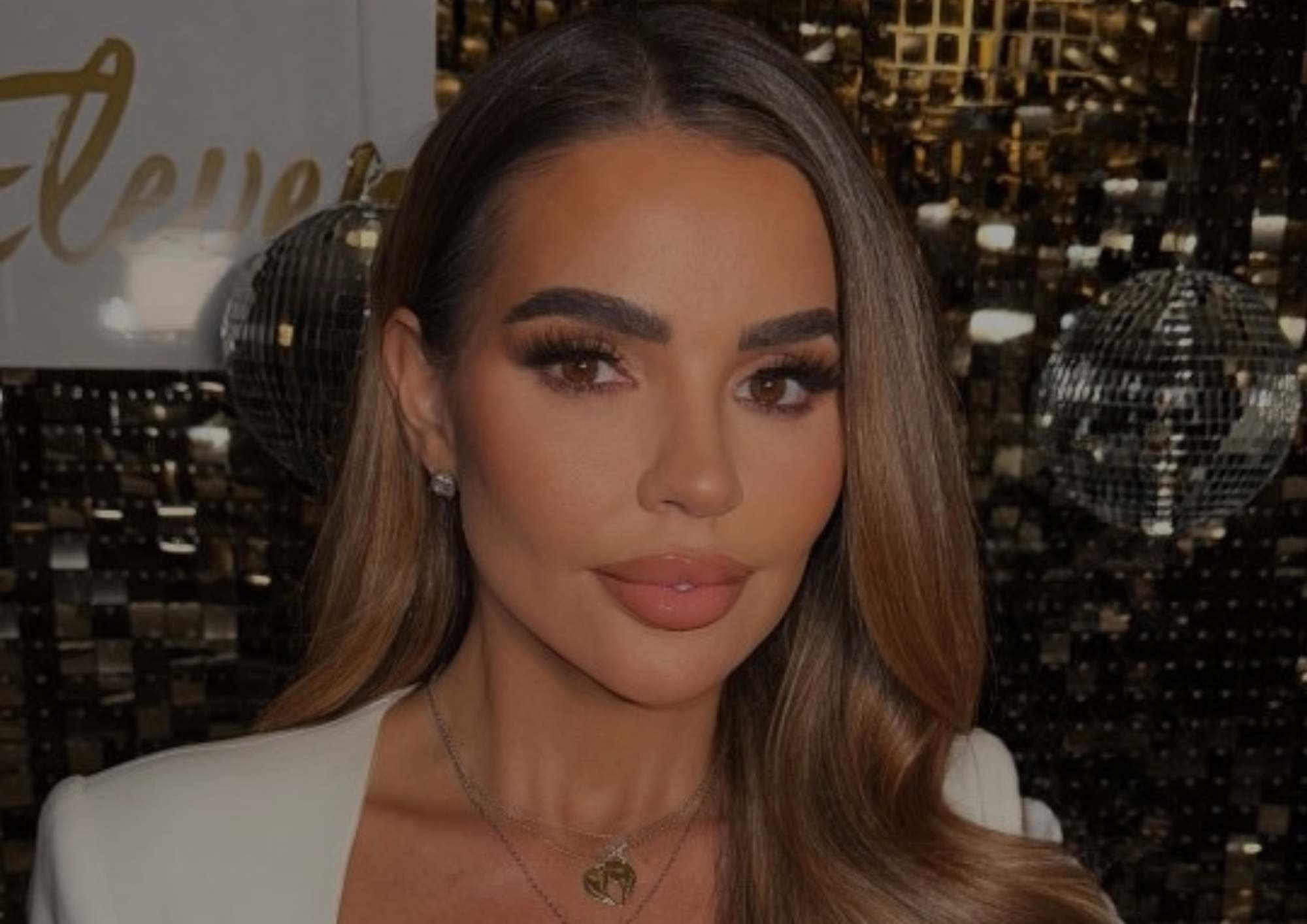 Tanya Bardsley close-up smiling in a white top Tanya Bardsley close-up smiling in a white top